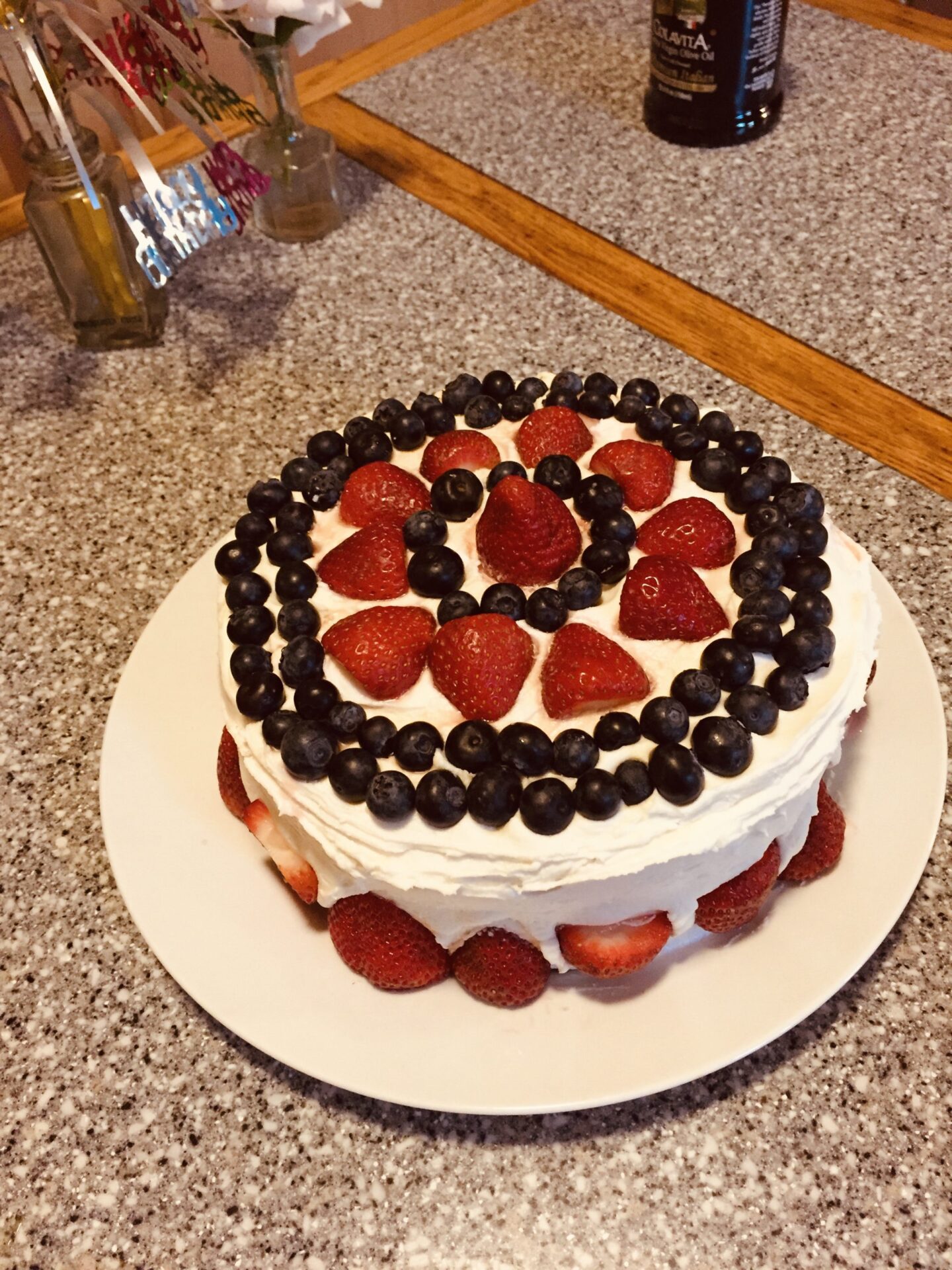 fourth of july cake with strawberries and blueberries